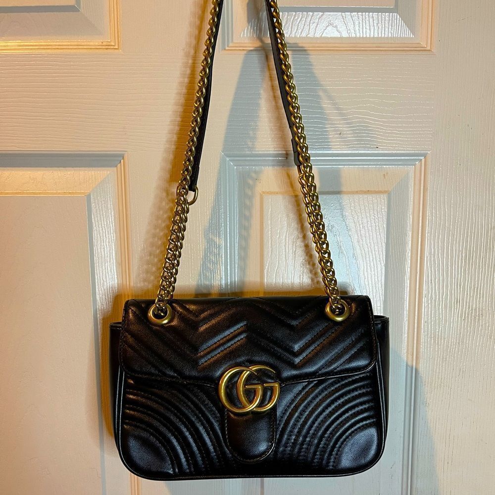 Fashion inspired black quilted shoulder/crossbody bag ,gold tone strap &…